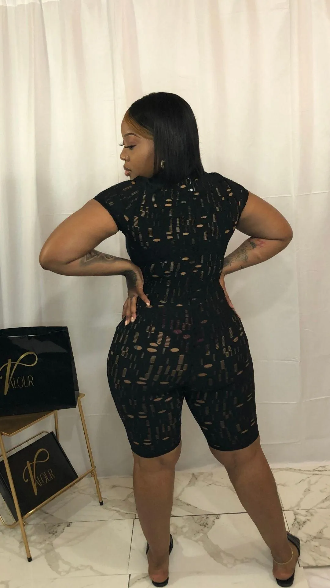 Calli black holes one piece romper bodysuit